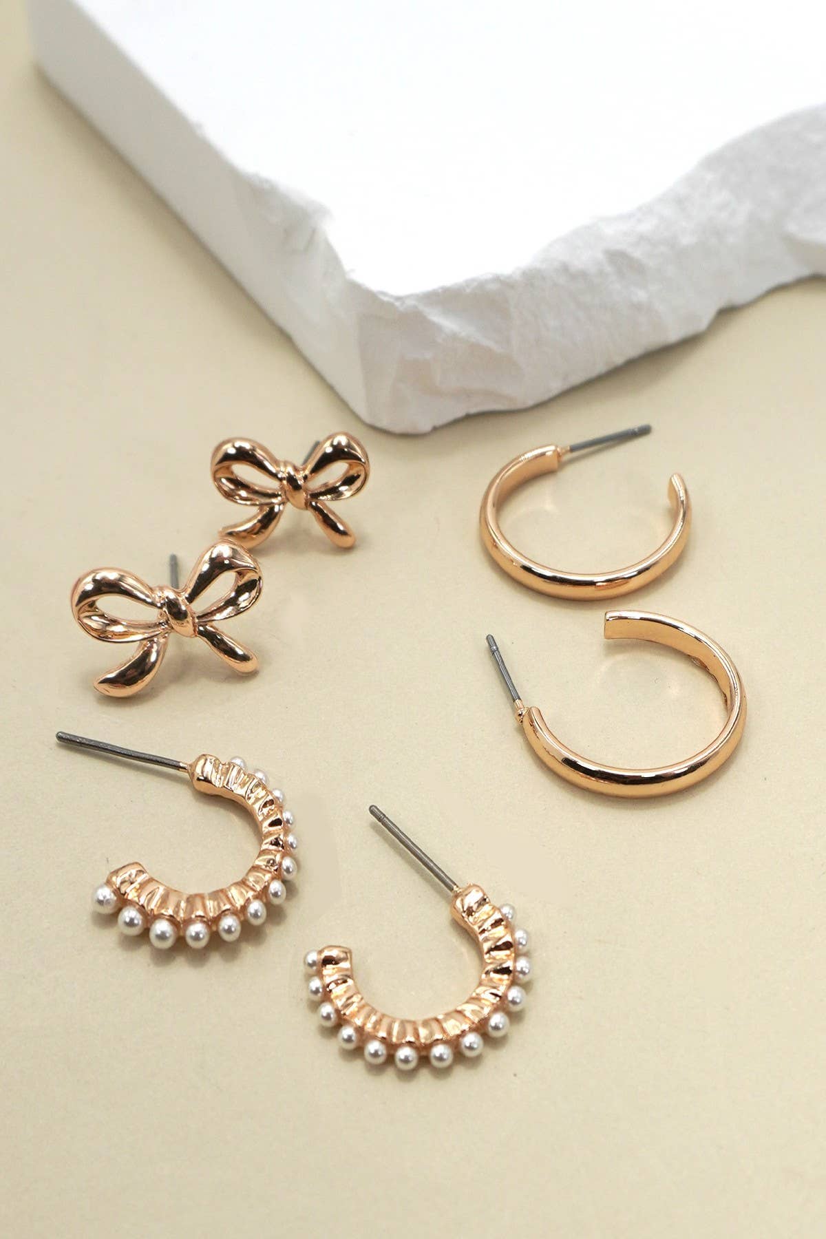 BOW PEARL STUDDED GOLD HOOP TRIO EARRINGS | 80E6403: Gold JOSSLYN by wall to wall 