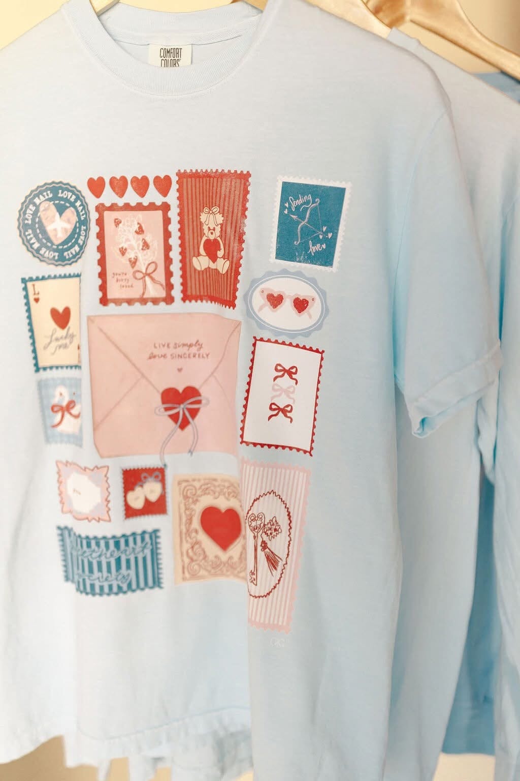 PREORDER | Valentine’s Day Stamp Light Blue Short Sleeve Graphic Tee Short sleeve Chaudoin Creations 