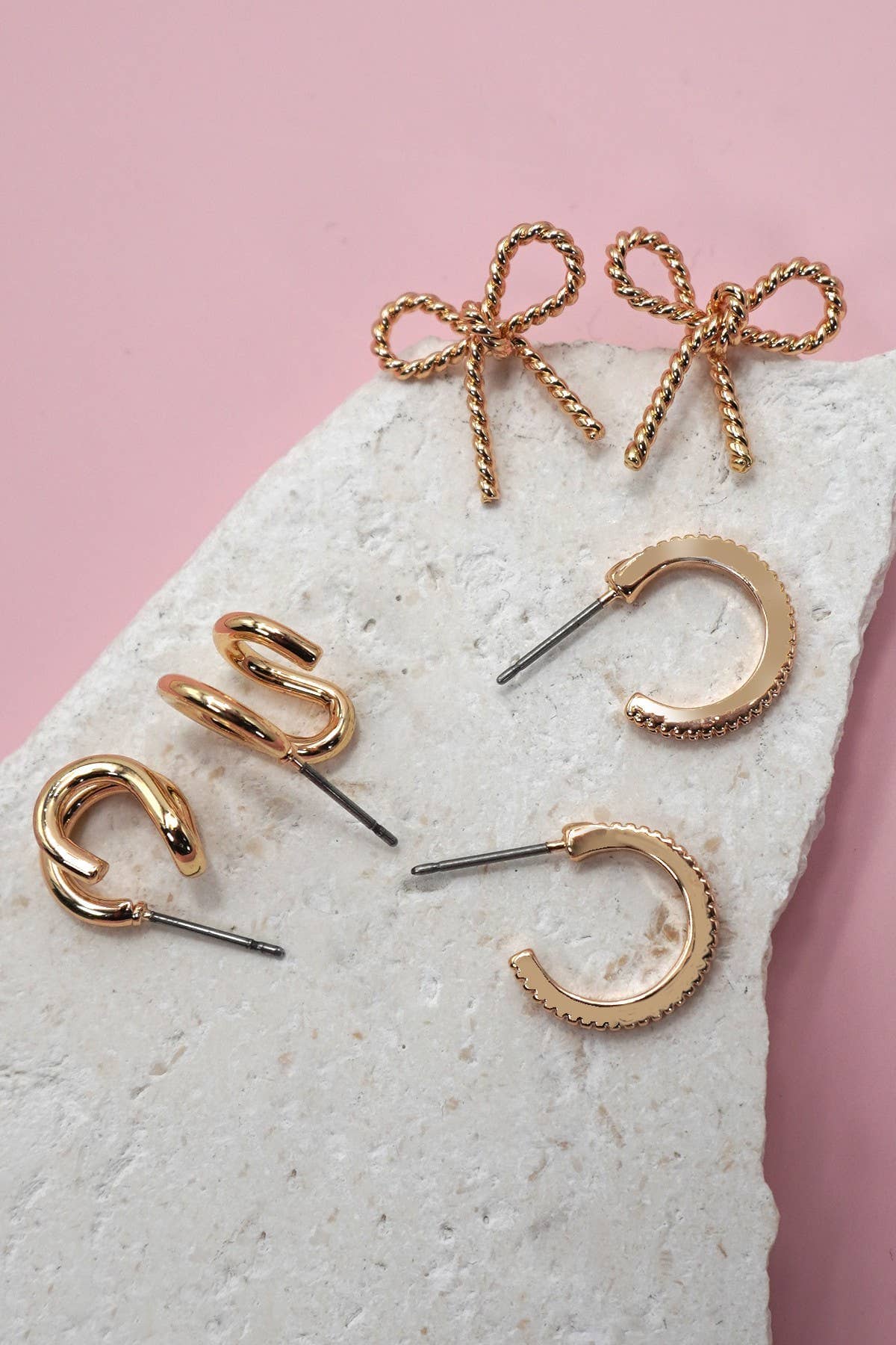 TRIO HUGGIE BOW HOOP TITANIUM POST EARRINGS | 80E06205: Gold JOSSLYN by wall to wall 