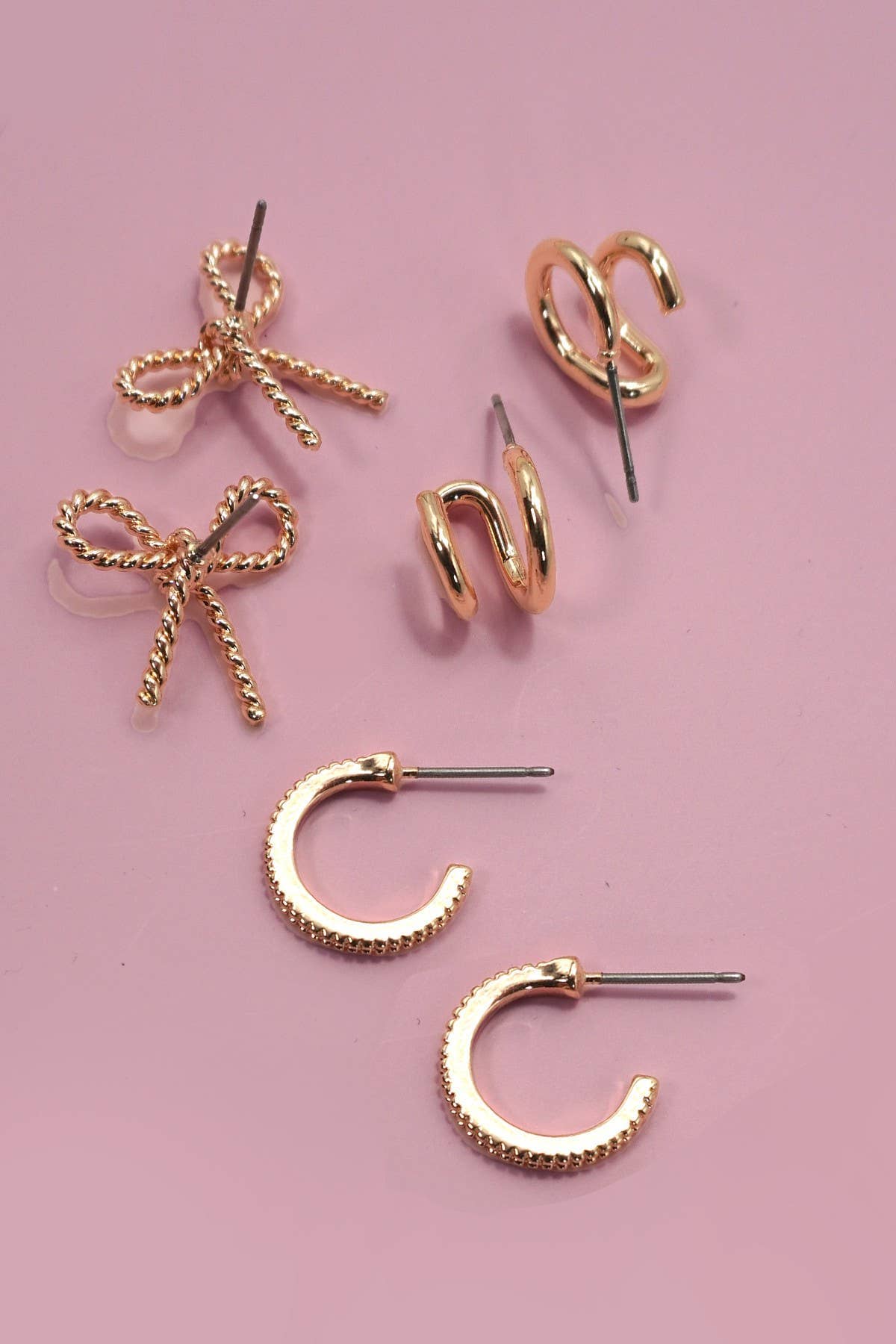 TRIO HUGGIE BOW HOOP TITANIUM POST EARRINGS | 80E06205: Gold JOSSLYN by wall to wall 