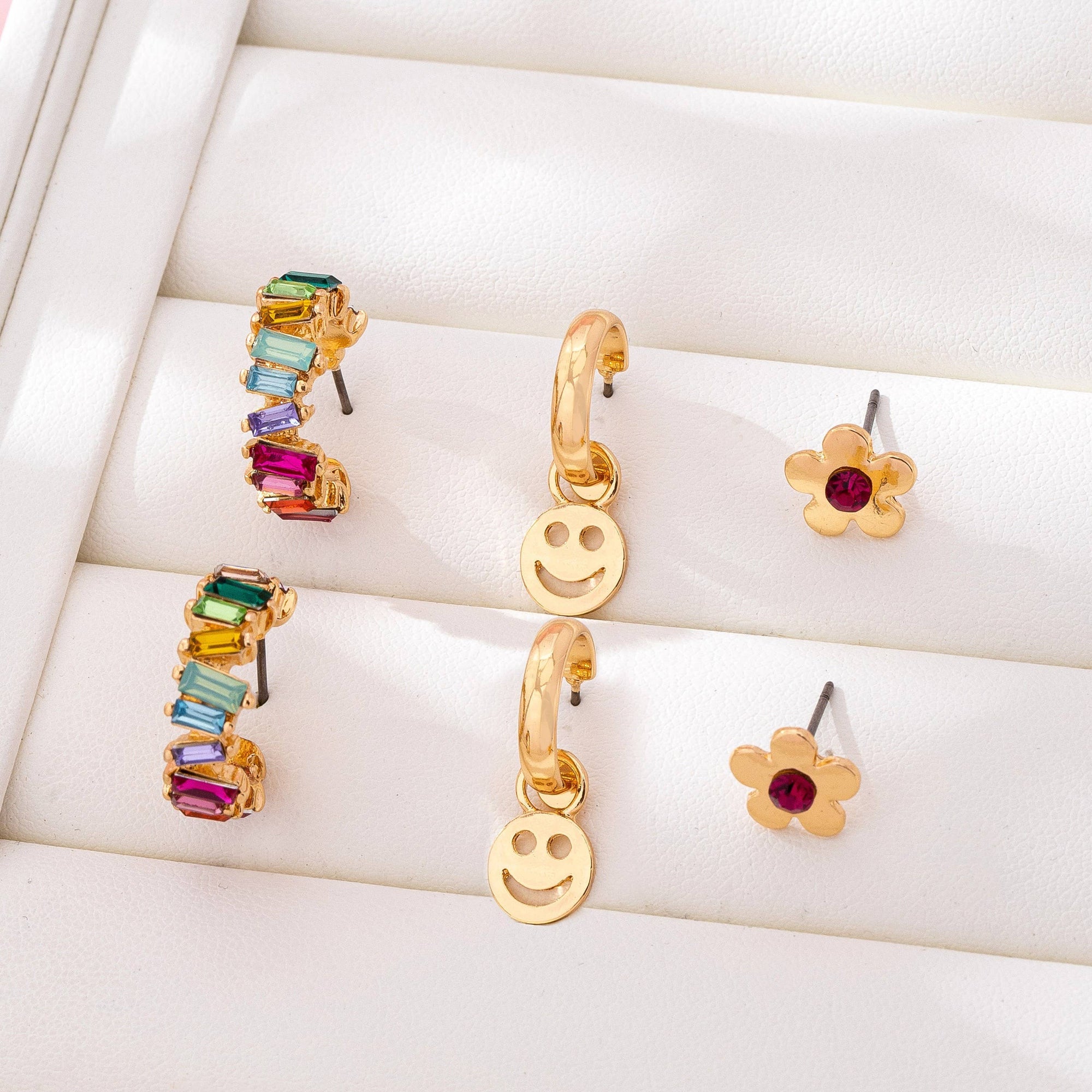 Rainbow Crystal, Smiley, and Floral Trio Earrings | 80E62109: Gold JOSSLYN by wall to wall 