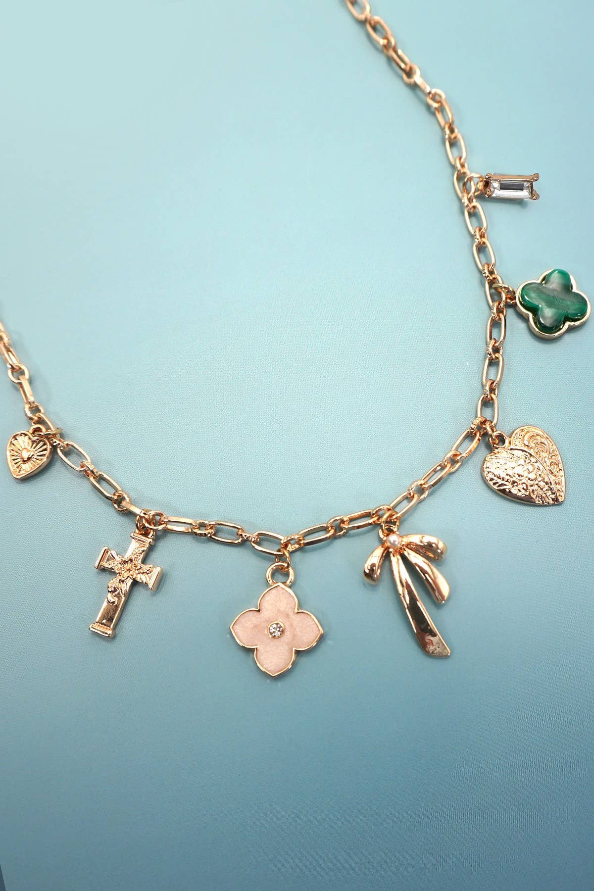 CHARM NECKLACE-GREEN CLOVER BOW CROSS HEART | 80N91991: GOLD JOSSLYN by wall to wall 